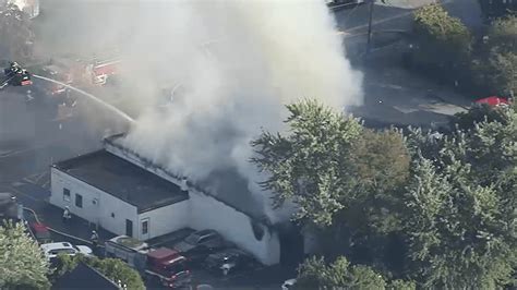 Large fire burns through building in Wayland